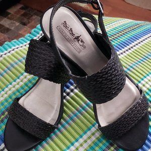 Coach and four black sandals.